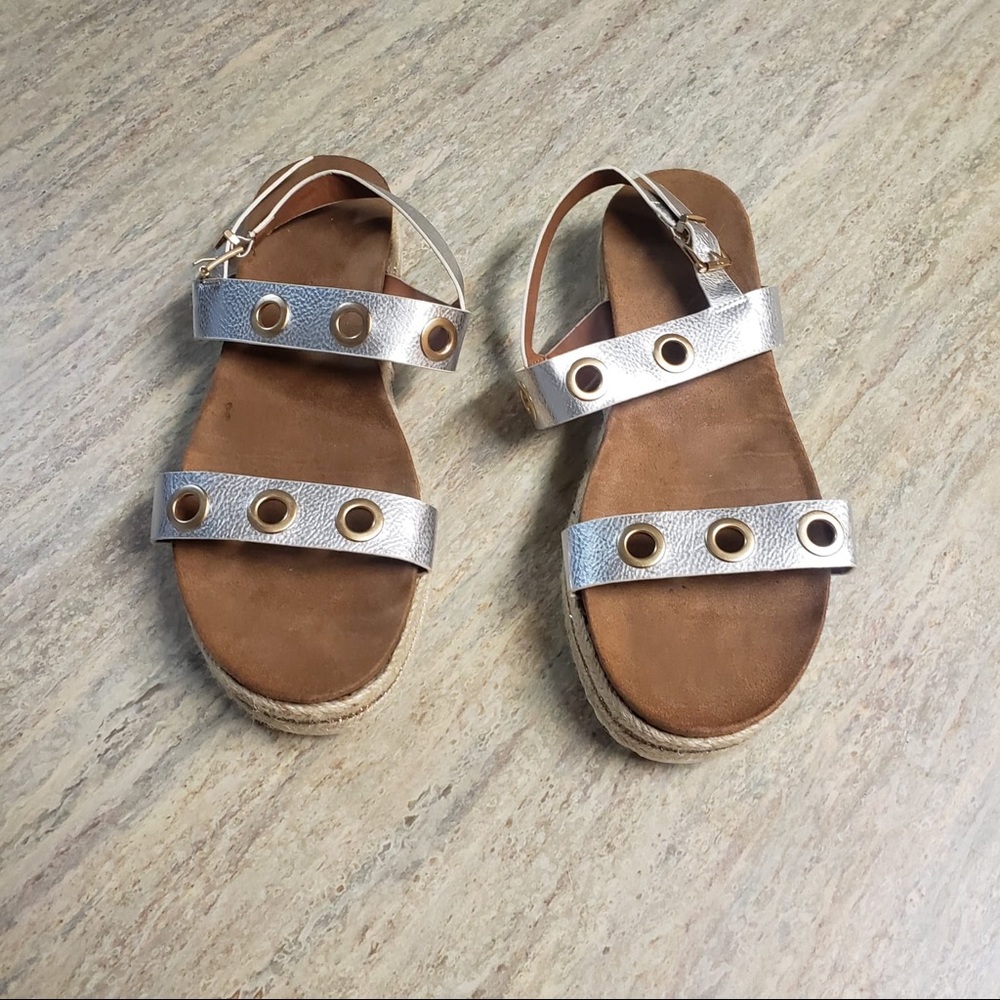 Clee sandals.Metallic silver with gold studs